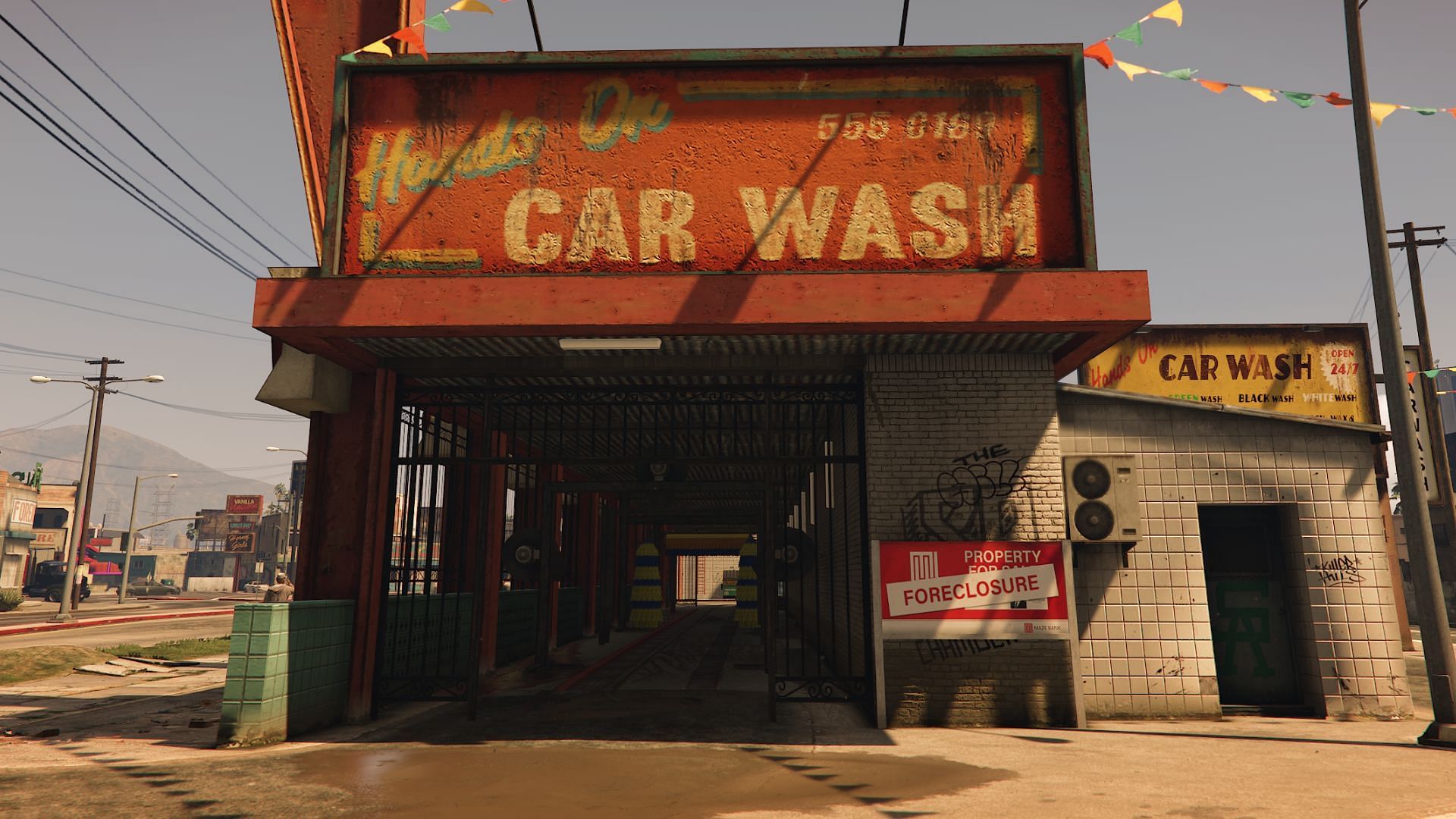Access the laptop in the Car Wash office to start the Compound Interest (Raf) mission (Image via Rockstar Games)