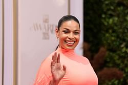 Jordin Sparks helps a fan who was suffering from heat exhaustion during her performance of "No Air" at Pride Fest in St. Louis