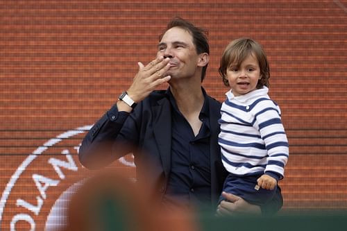 Rafael Nadal with son Rafa Jr. at the French Open farewell ceremony - Image Source: Getty