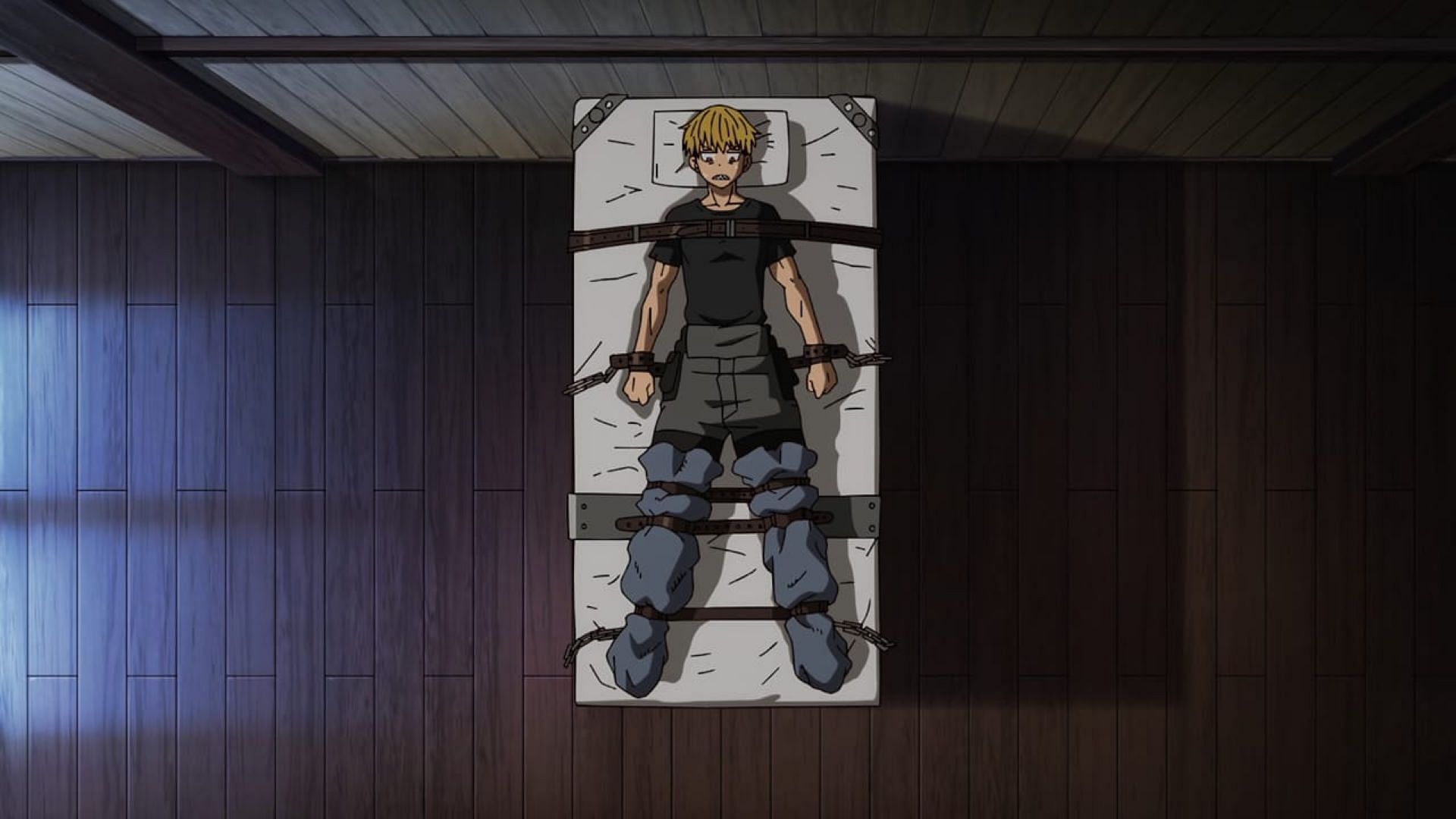 Shinra, as seen tied to a bed in Fire Force season 3 episode 12 (Image via David Production)