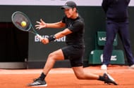 Tien plays a backhand at the 2025 French Open - Day Three - Source: Getty