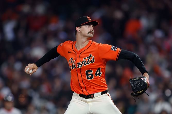 Giants pitcher Sean Hjelle under fire as wife Caroline accuses him of abuse and abandonment
