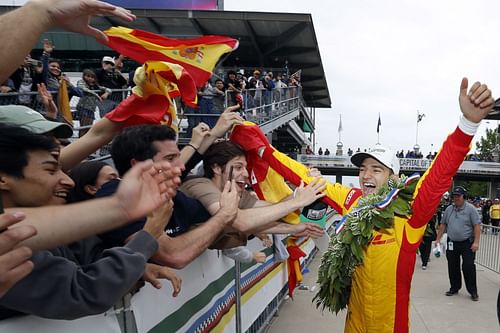 Alex Palou celebrates with fans after winning the 109th Running Of The Indianapolis 500 - Source: Getty