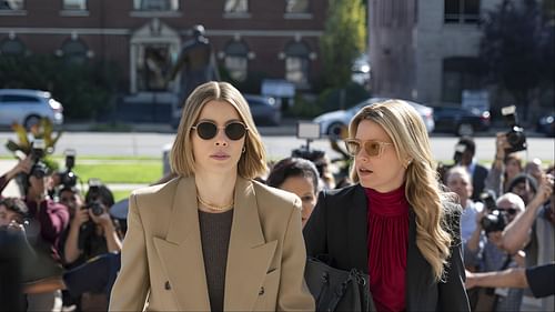 Jessica Biel and Elizabeth Banks as Chloe and Nicky walk past reporters during a high-stakes legal showdown in The Better Sister. (Image via Amazon Prime)