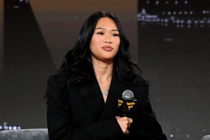 Olympic gold medalist Suni Lee rocks white jacket fit during UFC 317 in Las Vegas