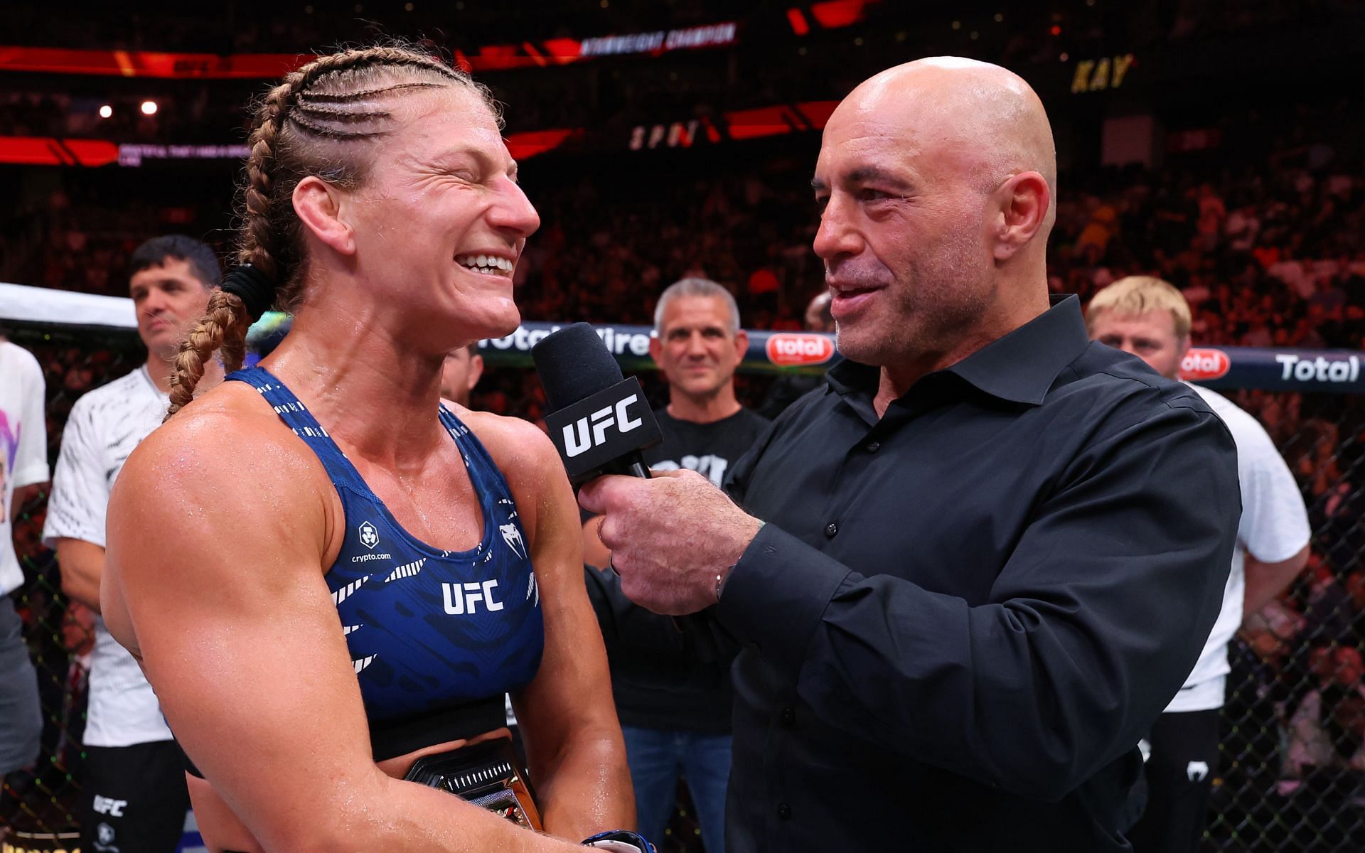 Kayla Harrison speaking to Joe Rogan after victory against Julianna Pena. [Image courtesy: Getty]