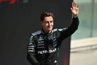 Race winner George Russell of Great Britain and Mercedes AMG Petronas F1 Team waves from the podium during the F1 Grand Prix of Canada at Circuit Gilles-Villeneuve - Source: Getty