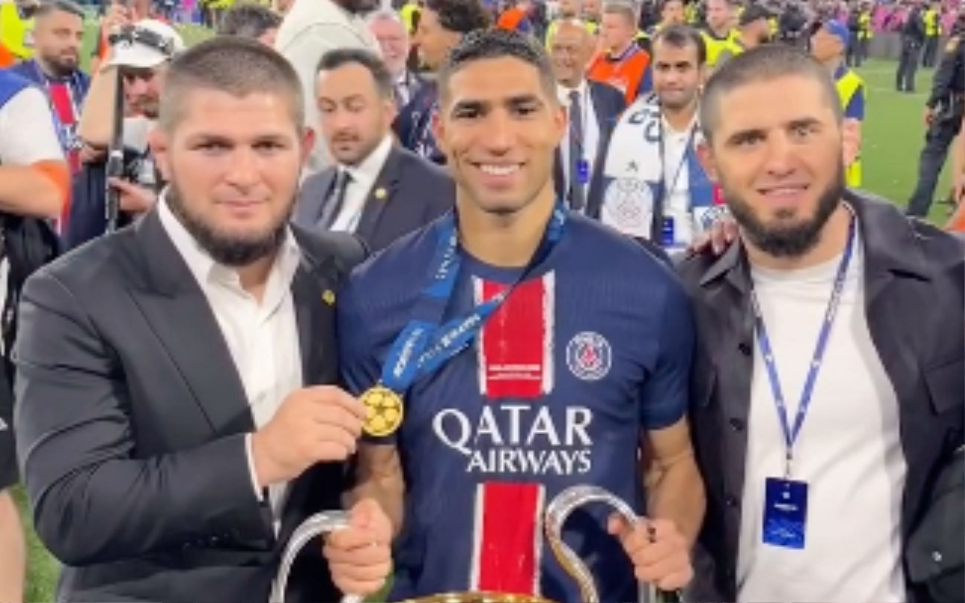 Khabib nurmagomedov and Islam Makhachev celebrating with Ashraf Hakimi [Image Courtesy: @tnt sportsufc on Instagram]