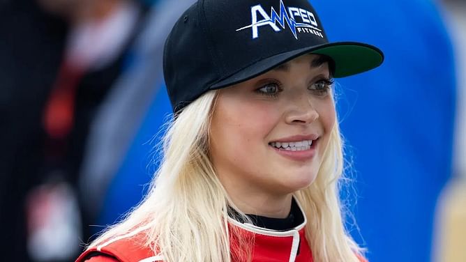 NASCAR driver Natalie Decker dons a black bikini as she rings in her 28th birthday poolside