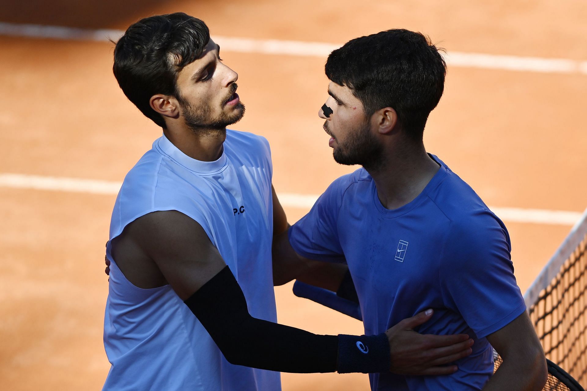 Lorenzo Musetti (left) and Carlos Alcaraz (right) at the 2025 Italian Open (Source: Getty)