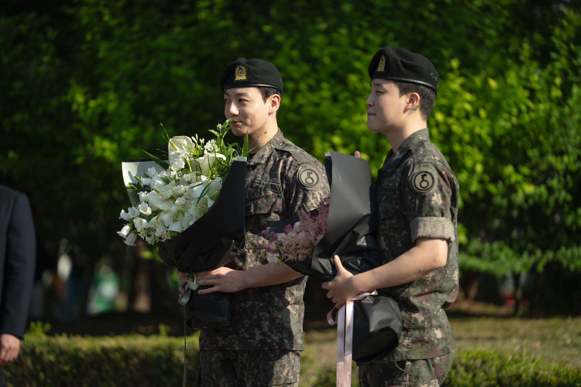 "The giggles are back"- Fans react as BTS’ Jimin and Jungkook go viral for adorable bouquet moment during military discharge ceremony