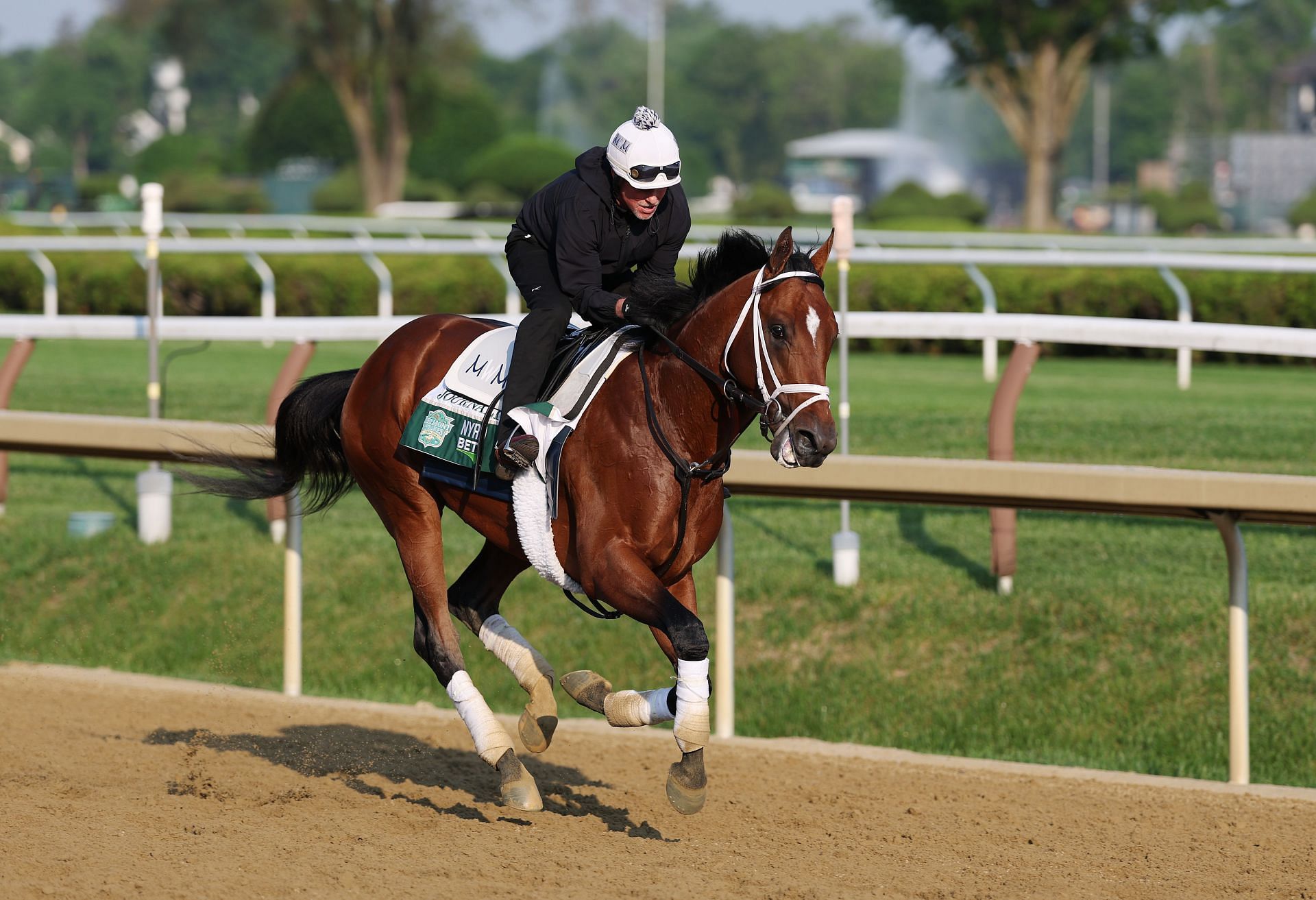 Journalism trains during the 157th running at Saratoga Race Course in Saratoga Springs, New York. (Photo by Getty Images)