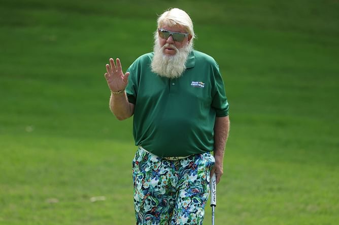 John Daly goes golfing with his son on a ‘beautiful day’ for a wallet commercial