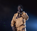 "Bro dropped a short story on there" — Internet reacts to Kodak Black signing a fan's shirt for almost 5 minutes after they asked for an autograph