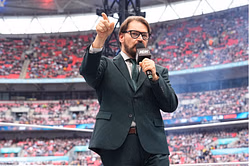 Tony Schiavone says top AEW star has been hospitalized; All In match in jeopardy?