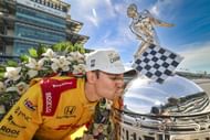 Alex Palou kisses the Borg-Warner tropy after winning the 109th Running of the Indianapolis 500 - Source: Getty