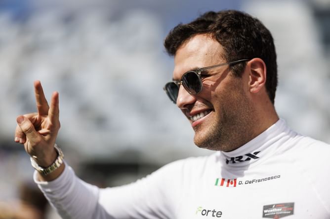 Devlin DeFrancesco makes IndyCar cameraman's day at Road America, a week after they collided on pit road
