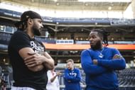 Vladimir Guerrero Jr. having a chat with Fernando Tatis Jr. before a game - Source: Getty