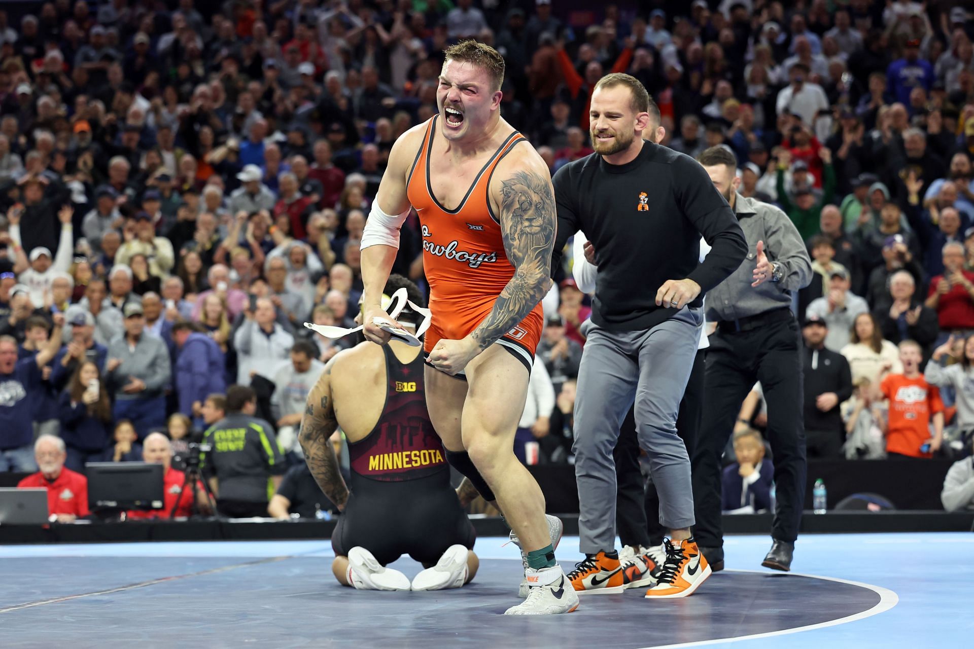 David Taylor and Wyatt Hendrickson at the 2025 NCAA Division I Men&#039;s Wrestling Championship - Source: Getty