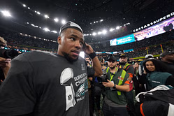 Eagles' Saquon Barkley rocks flashy diamond chain celebrating Madden 26 99 rating
