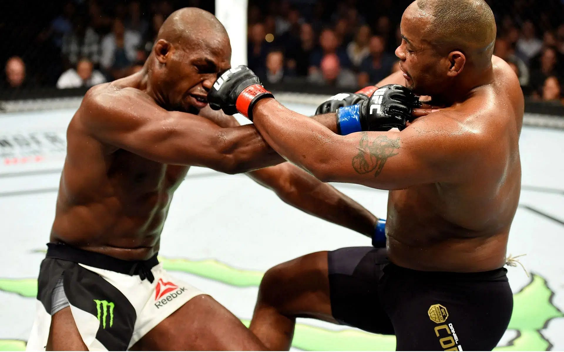 Daniel Cormier (right) discusses Jon Jones