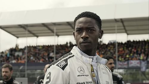 Damson Idris as Joshua 'Noah' Pearce prepares for the grid in F1: The Movie, filmed at real Formula 1 circuits. (Image via AppleTV)