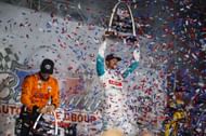 Kyle Kirkwood celebrates on the podium after winning IndyCar Bommarito Automotive Group 500 - Source: Getty