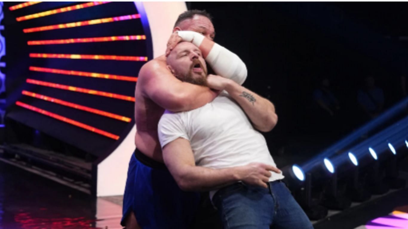 AEW world champion Moxley being choked out by Samoa Joe [ Image from allelitewrestling.com ]