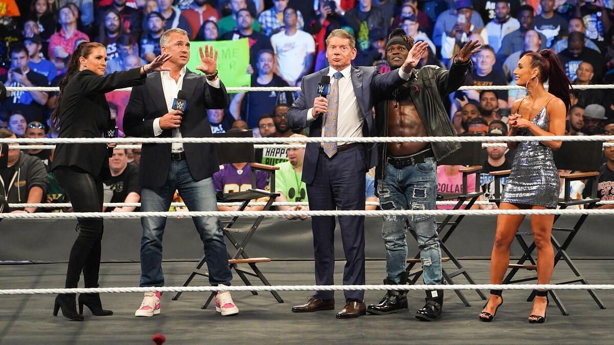 Left to right: Stephanie McMahon, Shane McMahon, Vince McMahon, R-Truth, Carmella [Image Credit: wwe.com]