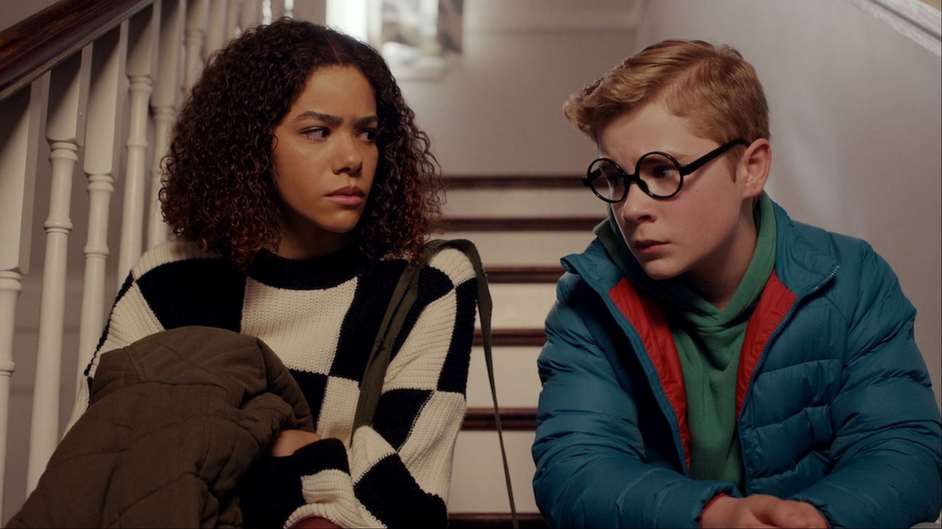 In Ginny &amp; Georgia season 3, Ginny comforts Austin following a difficult moment at home, highlighting the sibling bond that deepens while Georgia is behind bars. (Image via Netflix)