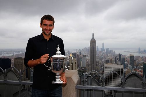 Cilic with the winner's trophy at the 2014 US Open - Source: Getty