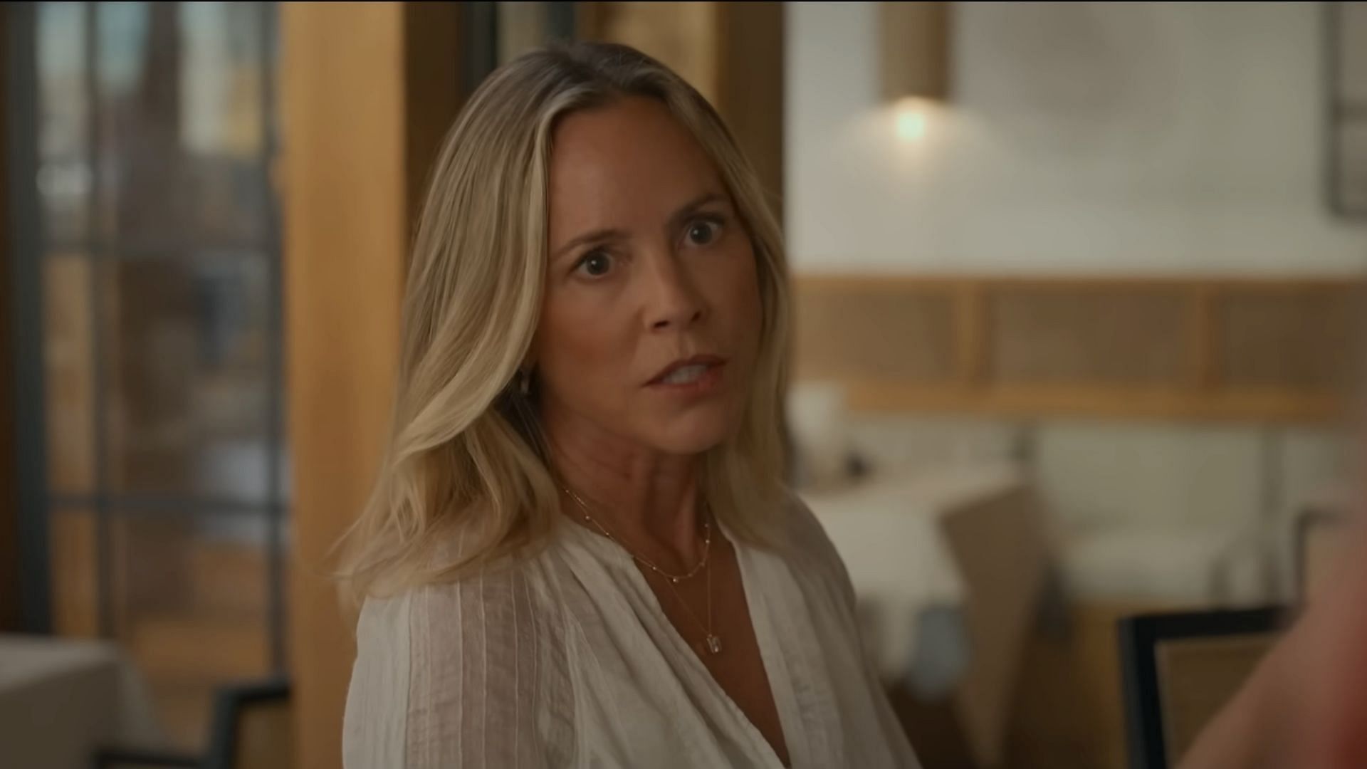 Maria Bello plays Belle (Image via Netflix)