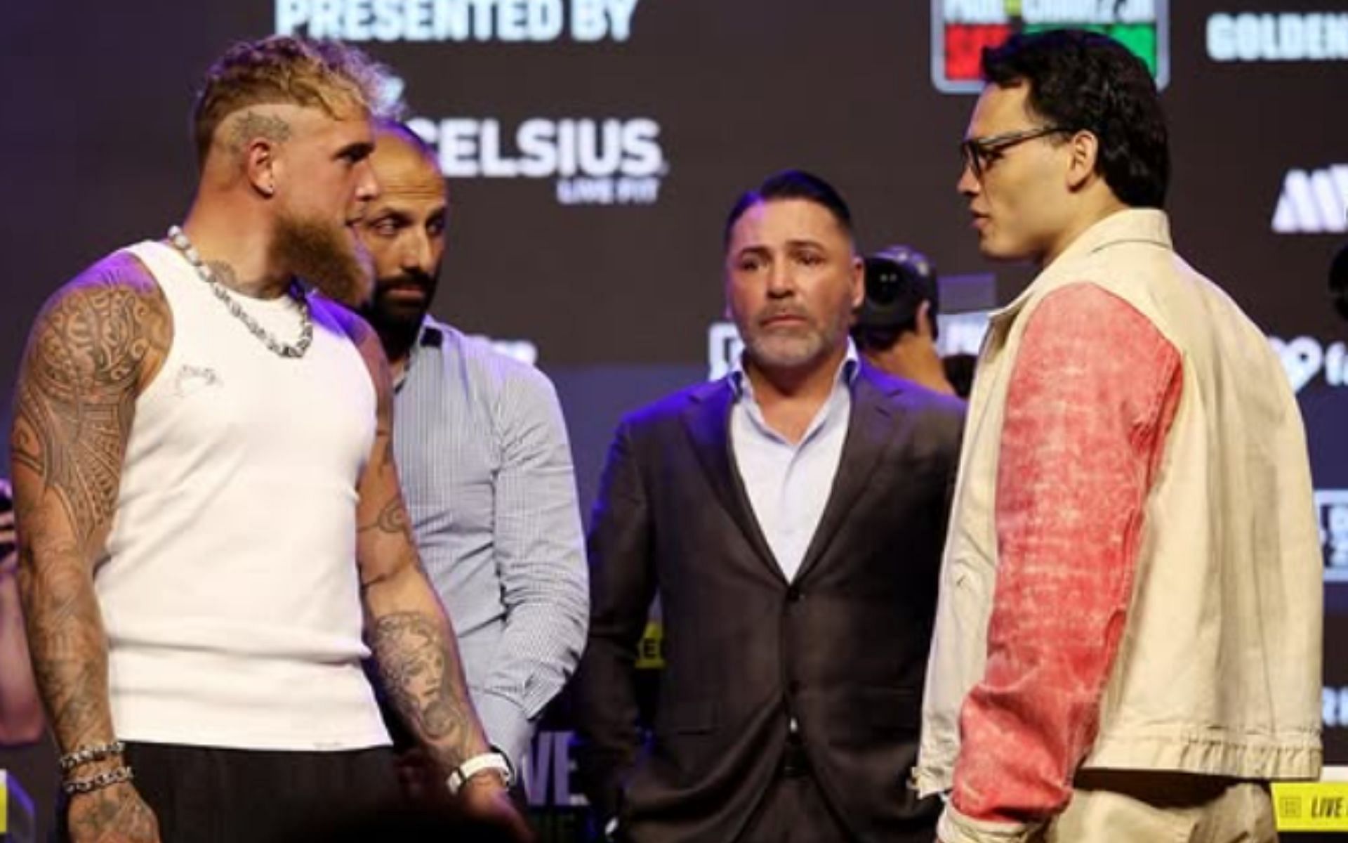 Oscar De La Hoya (wearing black suit) believes Jake Paul (left) could become a serious contender if he defeats Julio Caesar Chavez Jr. (right). [Image courtesy: @oscardelahoya on Instagram]
