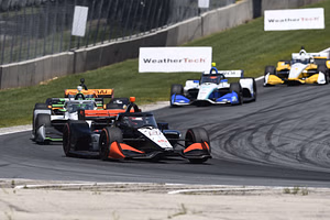 Who is the only IndyCar driver to sweep the Iowa doubleheader?