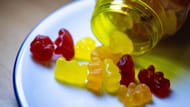 Children's vitamin bears on a plate (Image via Getty)