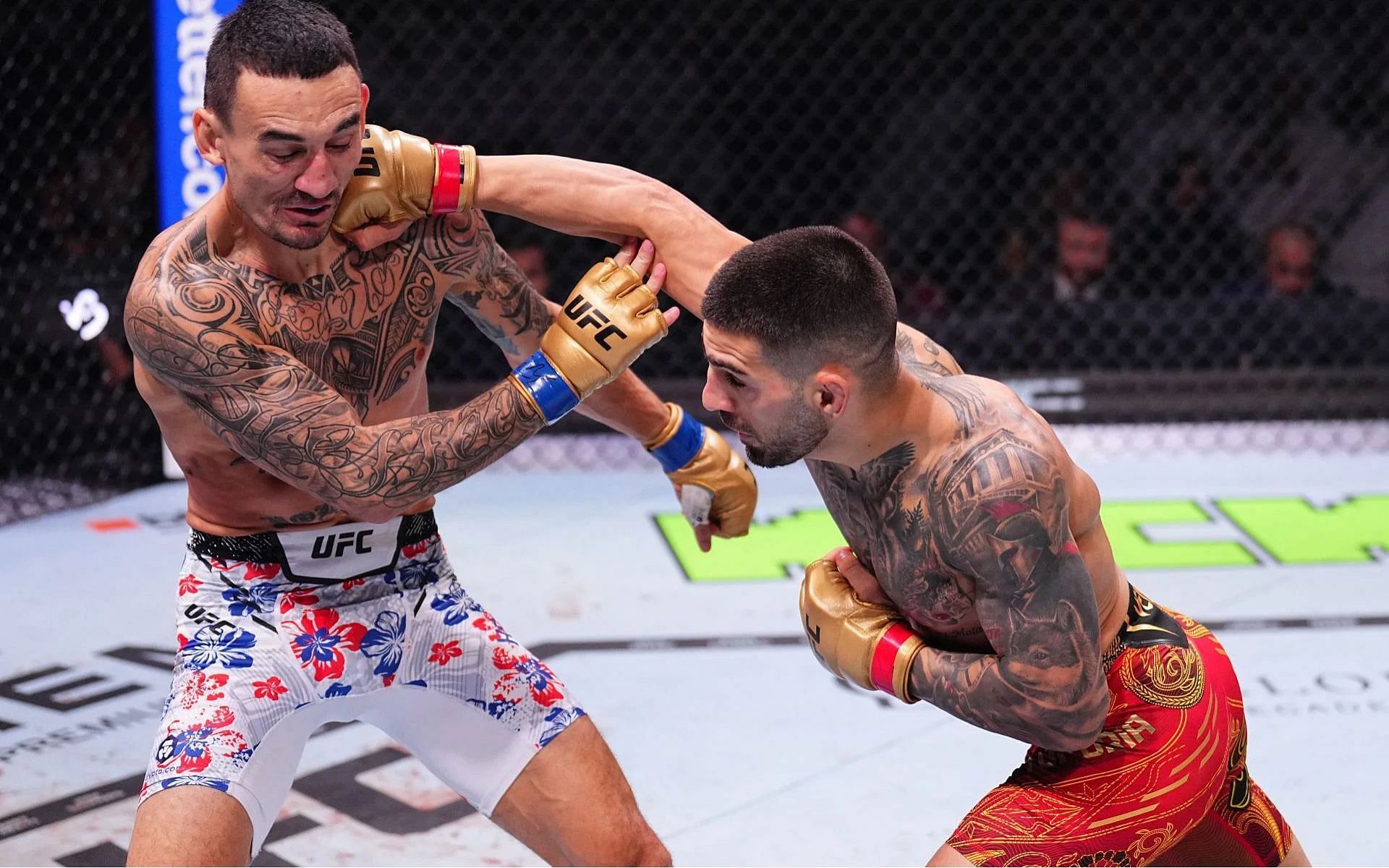 Max Holloway (left) wants to face Ilia Topuria (right) again. [Image courtesy: Getty]