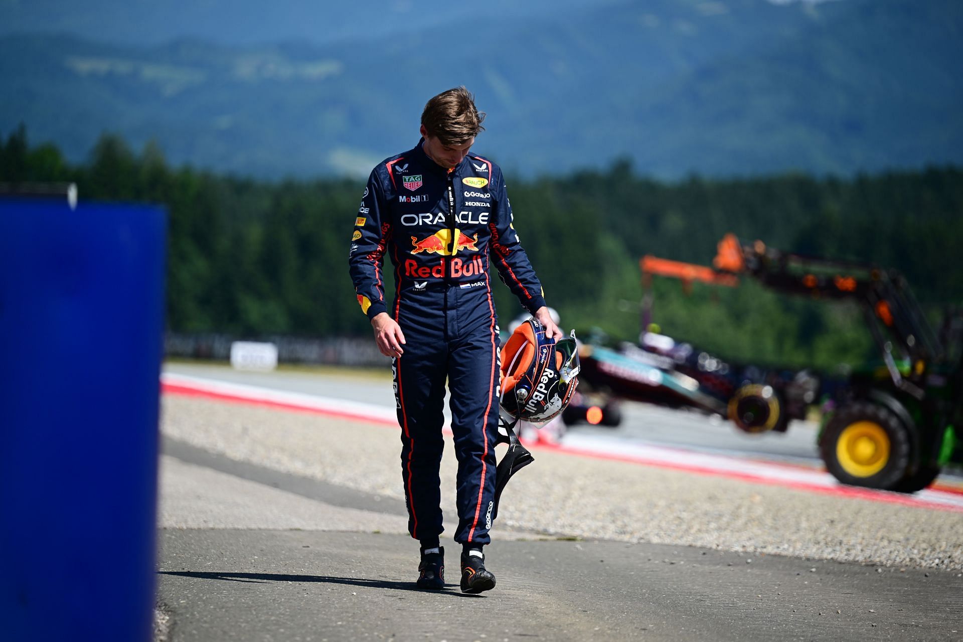 Max Verstappen of Red Bull Racing walks after a crash during the Austrian GP. Source: Getty