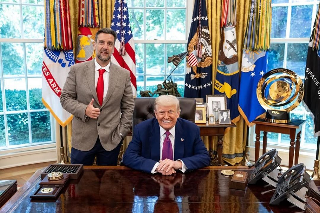Clay Travis poses for a picture in the oval office with President Donald Tump during his White House visit 
