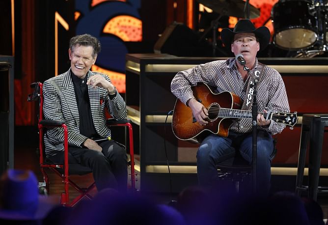 Why is Clay Walker in a wheelchair? Health issues explored in the aftermath of the viral Randy Travis video