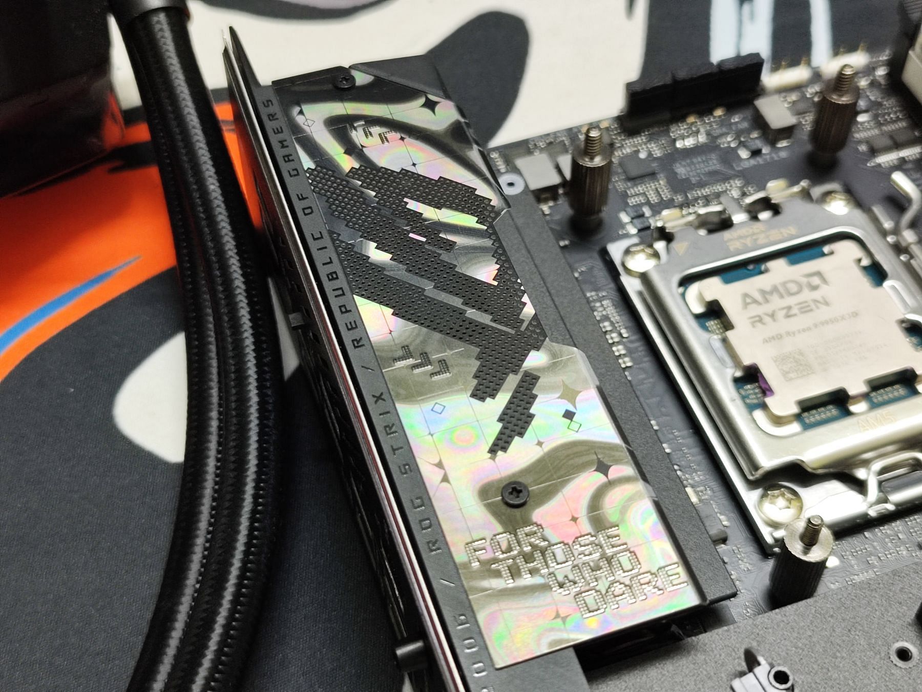 The VRM heatsinks on the X870-I are smaller than its larger ATX counterparts (Image via Sportskeeda)