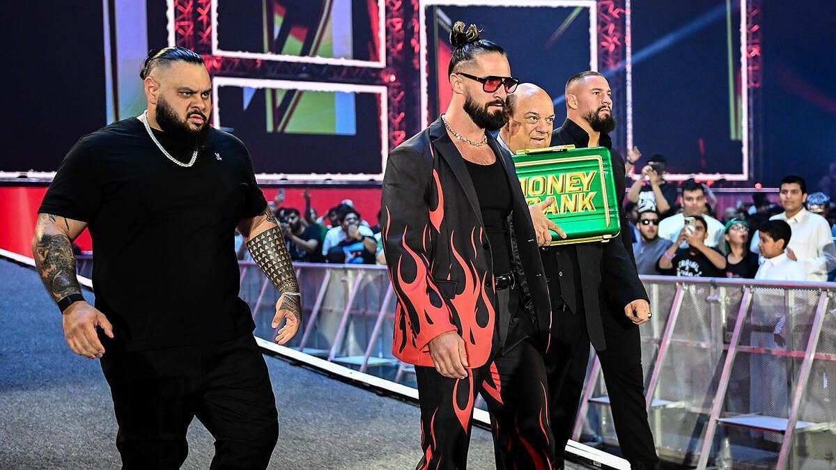Seth Rollins, Paul Heyman and co. (Image Credits: WWE.com)
