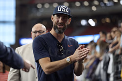 Michael Phelps reacts as NBA legend LeBron James tries new sport during offseason