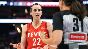 Caitlin Clark can't contain anger as she charges at official before getting held back
