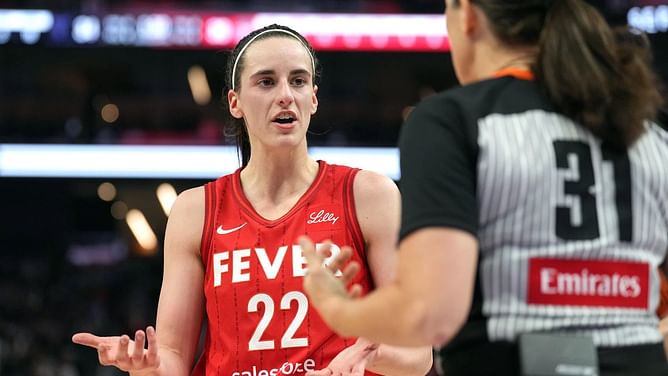 Caitlin Clark can't contain anger as she charges at official before getting held back