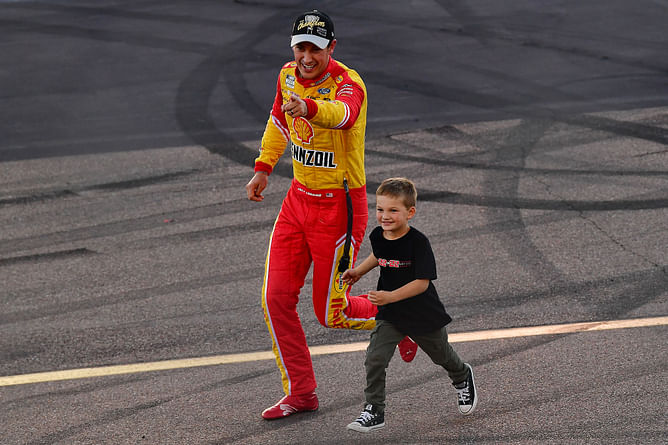 Joey Logano melts hearts on Jimmy Kimmel Live after his childhood recreated picture with son Hudson is displayed live