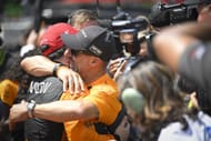 Pato O'Ward hugging Tony Kanaan after winning the 2025 NTT INDYCAR Series Ontario Honda Dealers Indy Toronto - Source: Getty