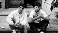 Menendez brothers in front of their Beverly Hills home (Image via Getty)