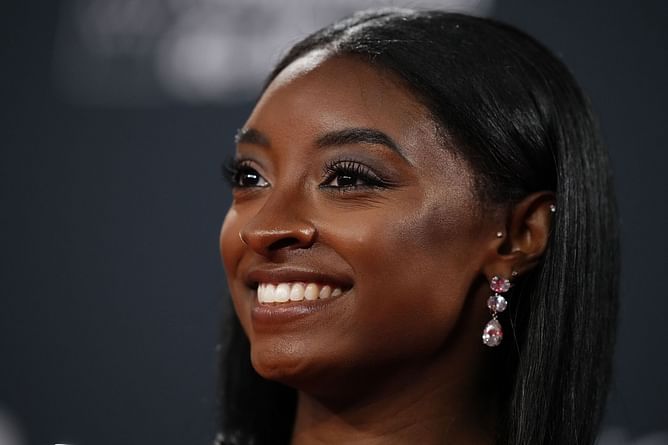 Simone Biles "obsessed" as she attends designer Hayley Paige's comeback event to bridal fashion world