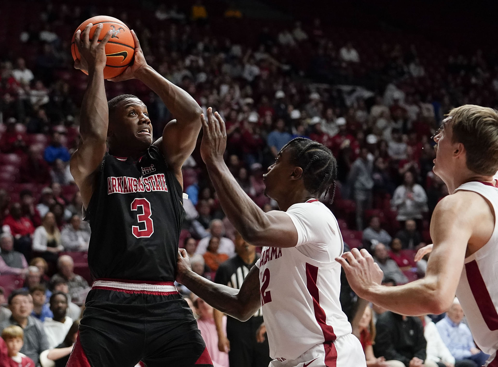 Arkansas State guard Derrian Ford (#3) shoots from the baseline over Alabama guard Latrell Wrightsell Jr. (12) at Coleman Coliseum (Credits: IMAGN)