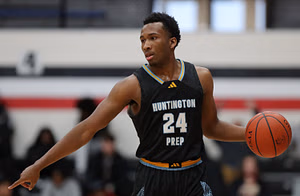 Kansas freshman Darryn Peterson reacts as elite NBA trainer gives him a major shoutout following training